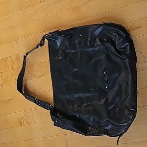 Women Cole haan black leather bag.